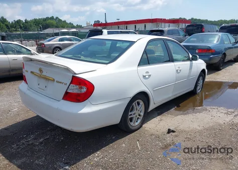 2002 Toyota Camry Le z USA, uszkodzony, nr VIN 4T1BE32K32U036878